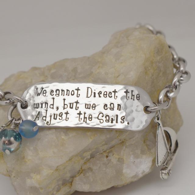 We cannot direct the wind but we can adjust the sails inspirational bracelet.jpg